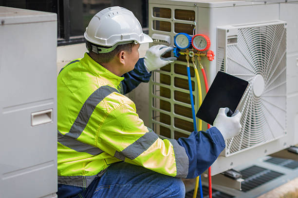 Professional Ac Installation technician working in Wales Center, NY